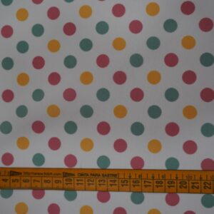 Tela estampada de lunares multicolor para flamenca sobre fondo blanco